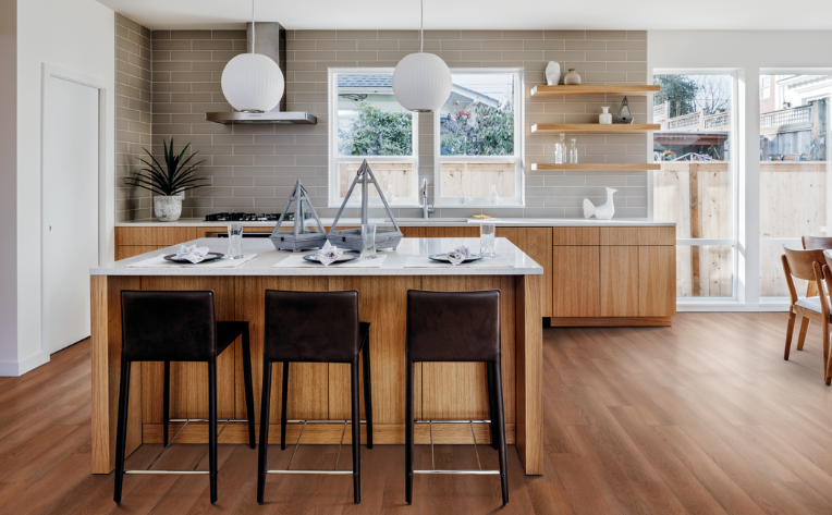 honey toned wood flooring in wood look kitchen